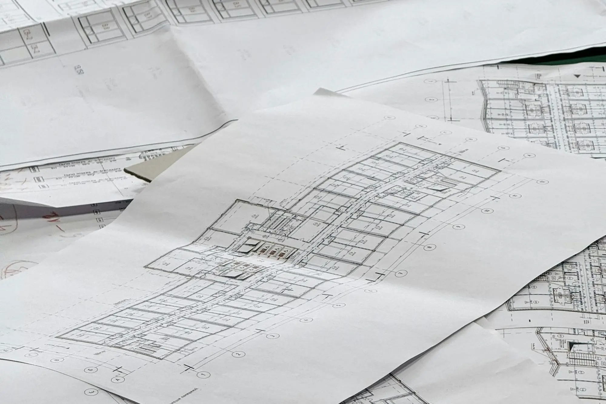 Construction drawings spread out on a table